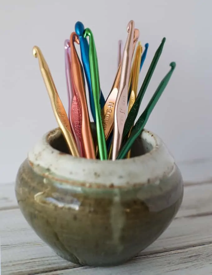 vase holding metal crochet hooks