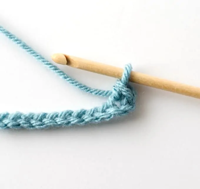 blue single crochet sample with wood hook