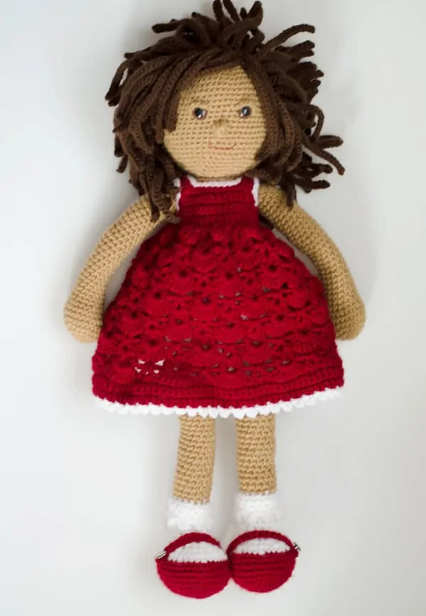 crochet doll with red dress