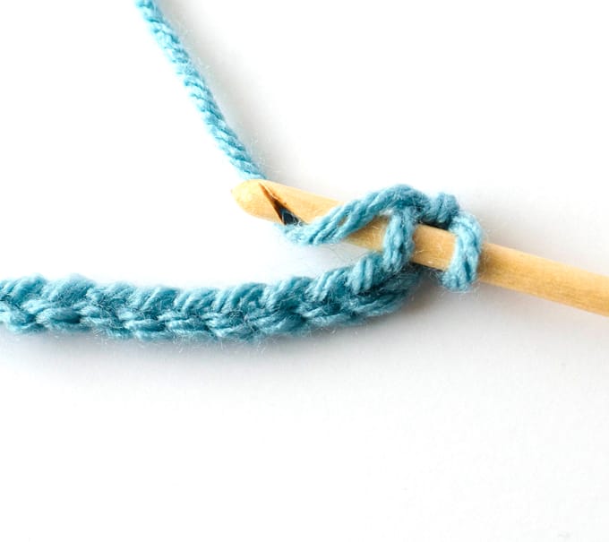 blue crochet chain with wood hook