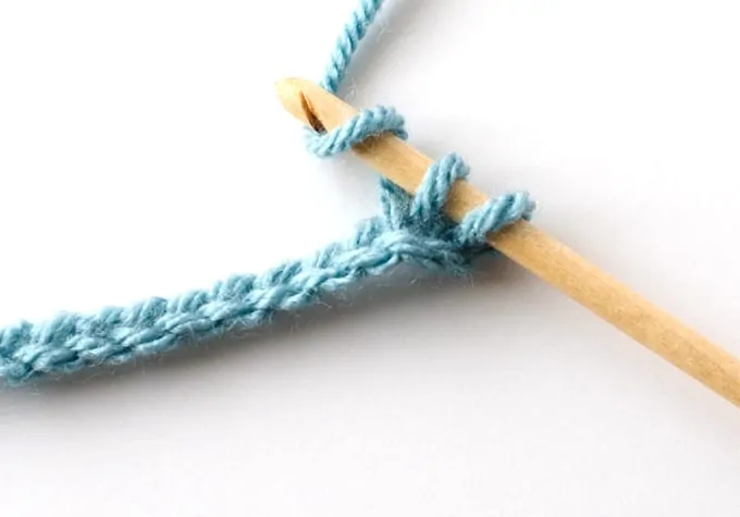 blue single crochet sample with wood hook