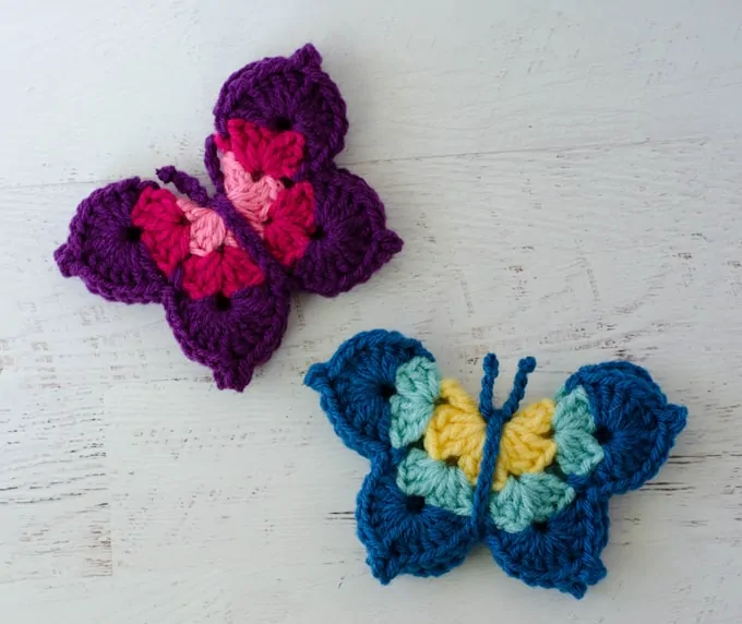 Pink and blue crochet butterflies
