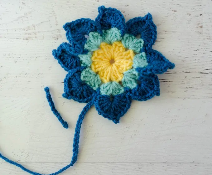 Yellow and blue crochet butterfly before assembly