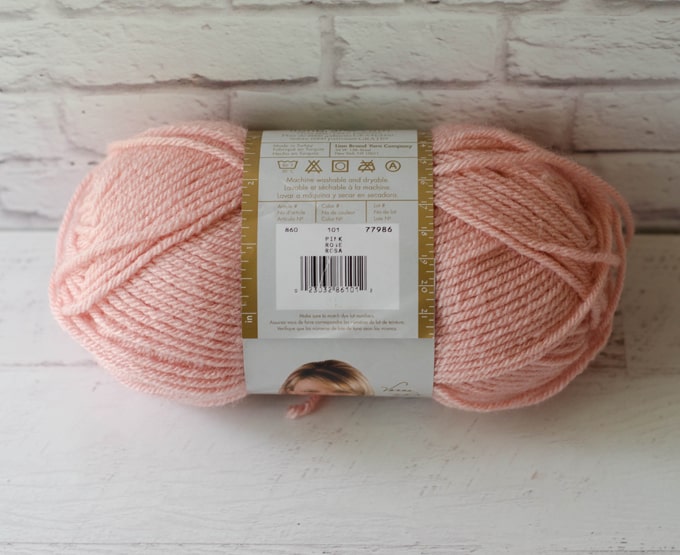 Skein of pink yarn with label