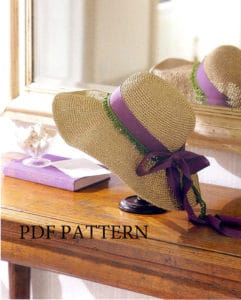 Crochet summer floppy hat with purple ribbon