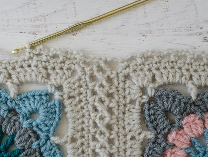 Flat Braid Join of Crochet afghan squares in cream, blue and gray yarn