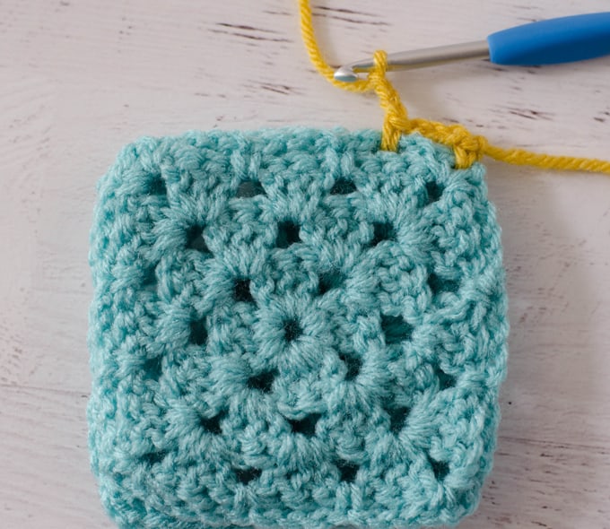 start of Crochet Faux Braid Join on blue granny square