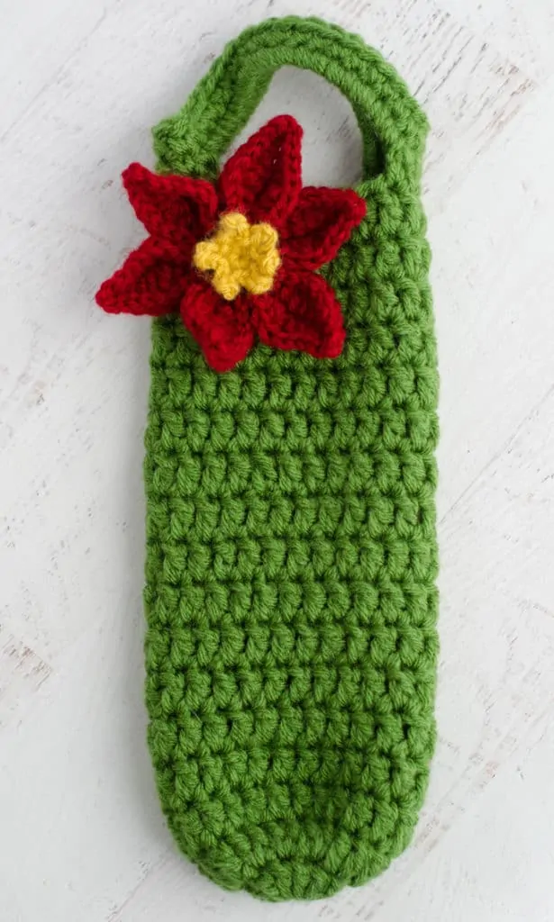 Crochet poinsettia wine cozy