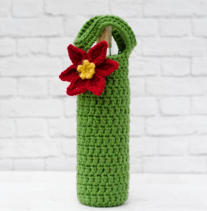 Crochet poinsettia wine cozy