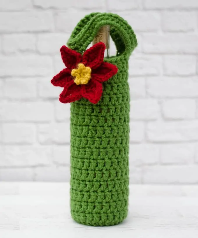 Crochet poinsettia wine cozy