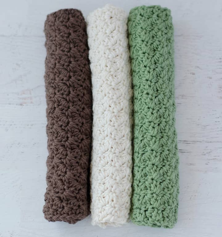 crochet dishcloths in ivory, green and brown