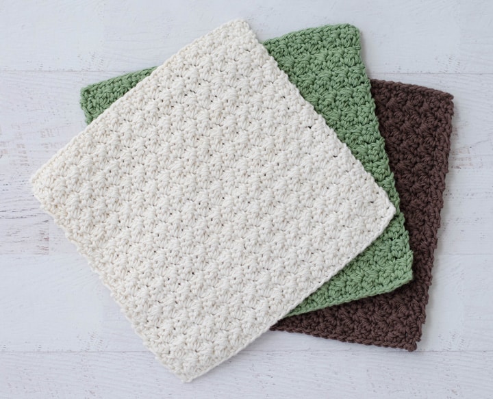 crochet dishcloths in ivory, green and brown