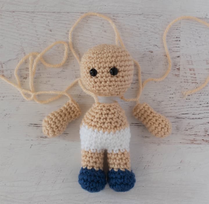 unassembled crochet doll