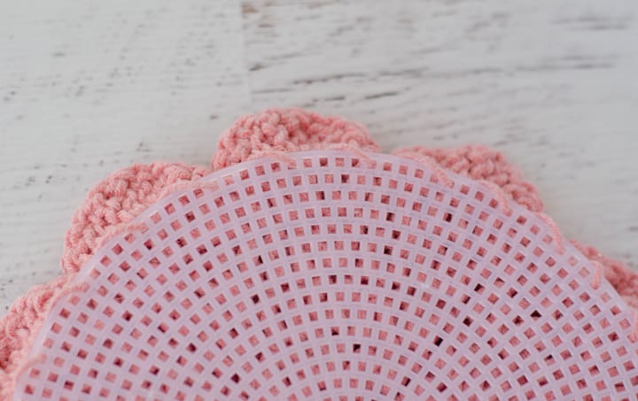 whip stitch edge on back of crochet flower