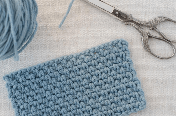 crochet stitch pattern in blue yarn