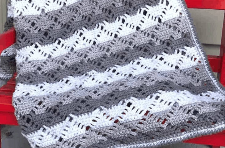crochet stitch pattern in gray and white yarn