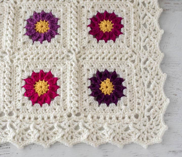 corner of lacy crochet flower afghan