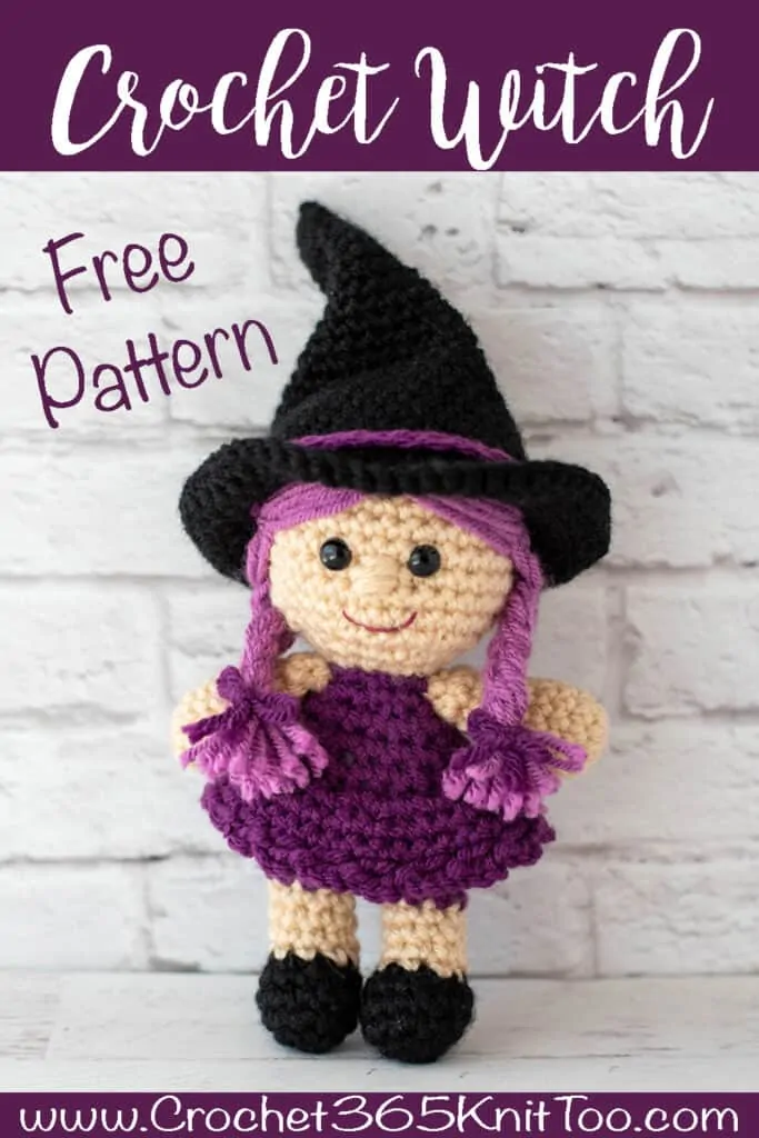 pink and purple crochet witch with black hat and shoes