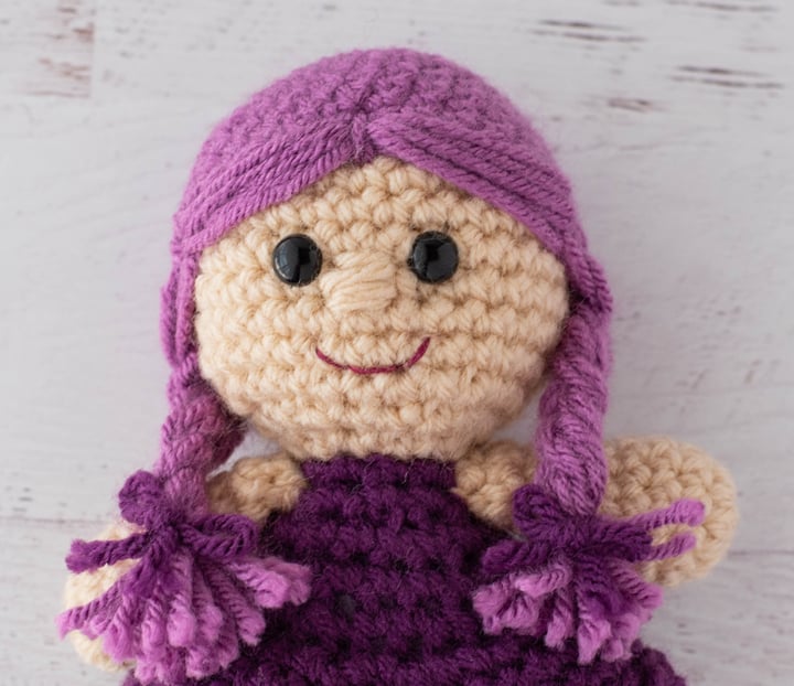 crochet doll with pink hair