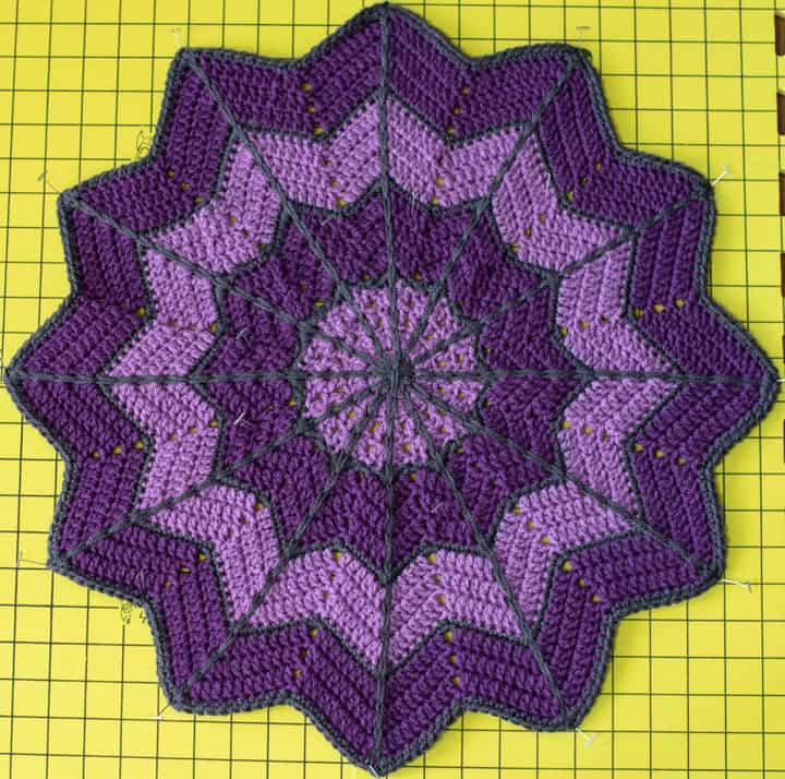 round ripple crochet baby lovey in dark and light purple