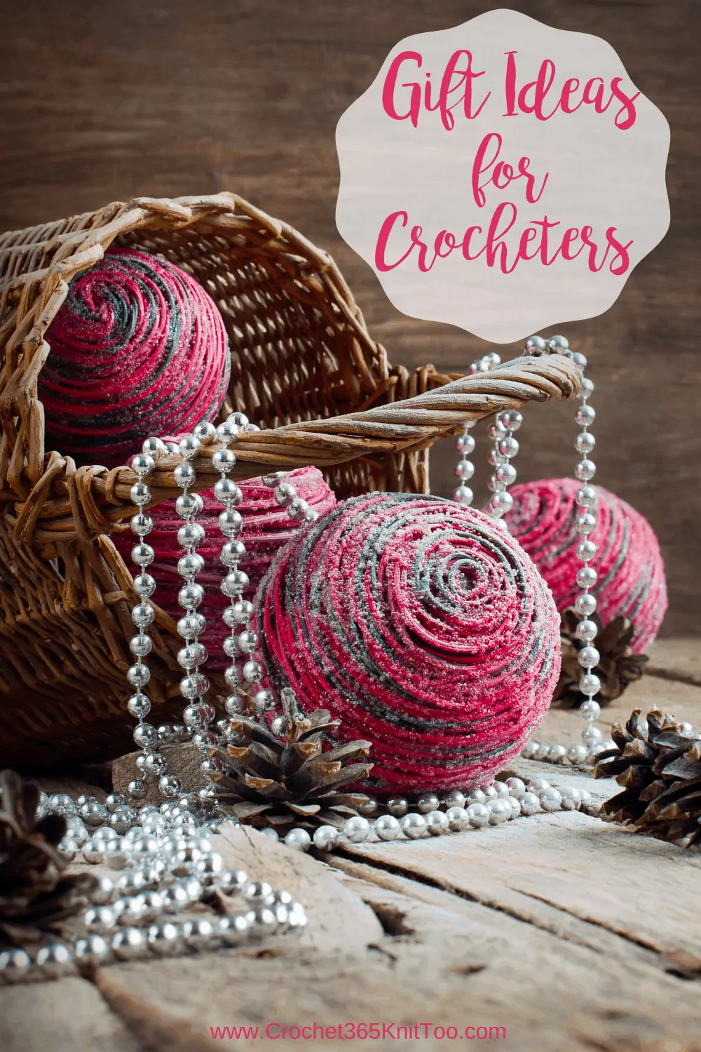 basket with balls of pink and gray yarn and silver bead strand