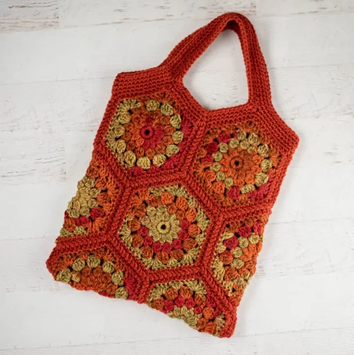 orange and green crochet hexagon tote bag