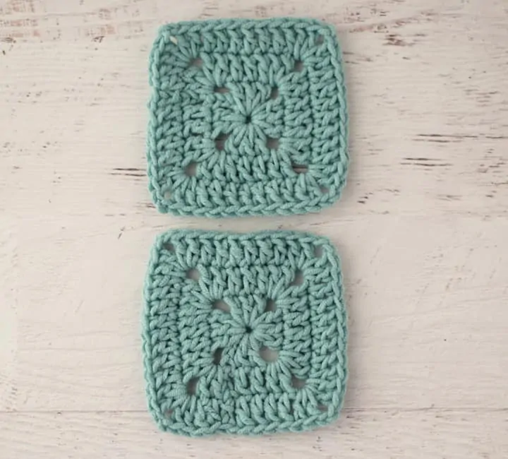 two blue crochet granny squares