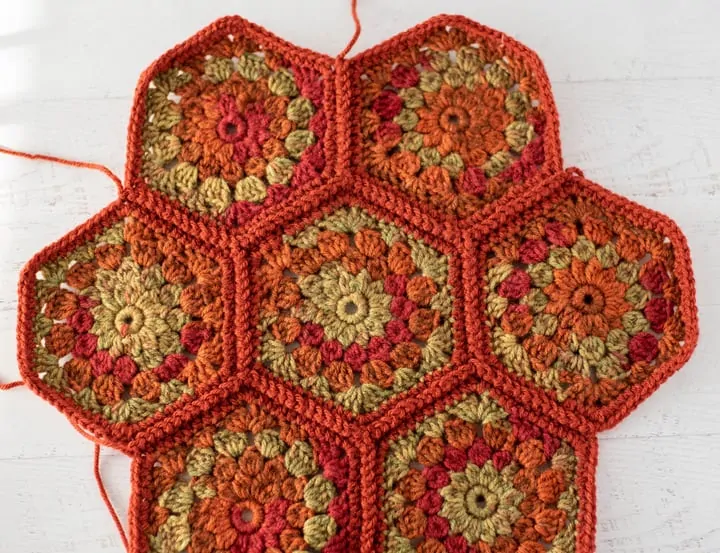 orange and green crochet hexagons