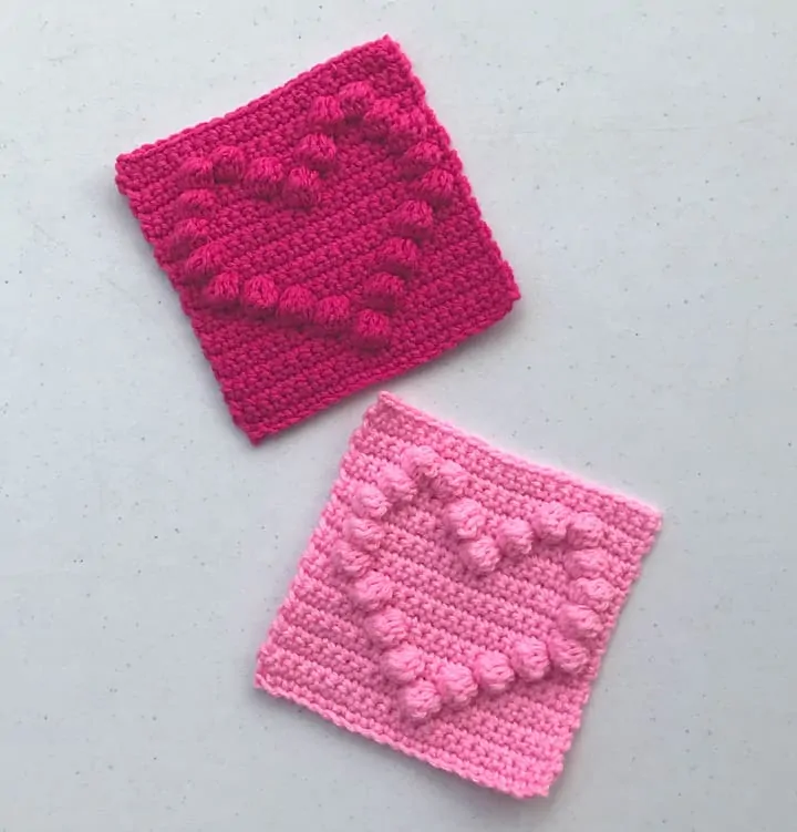 Pink crochet squares with raised hearts