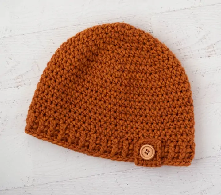 Rust color crochet hat with wood button