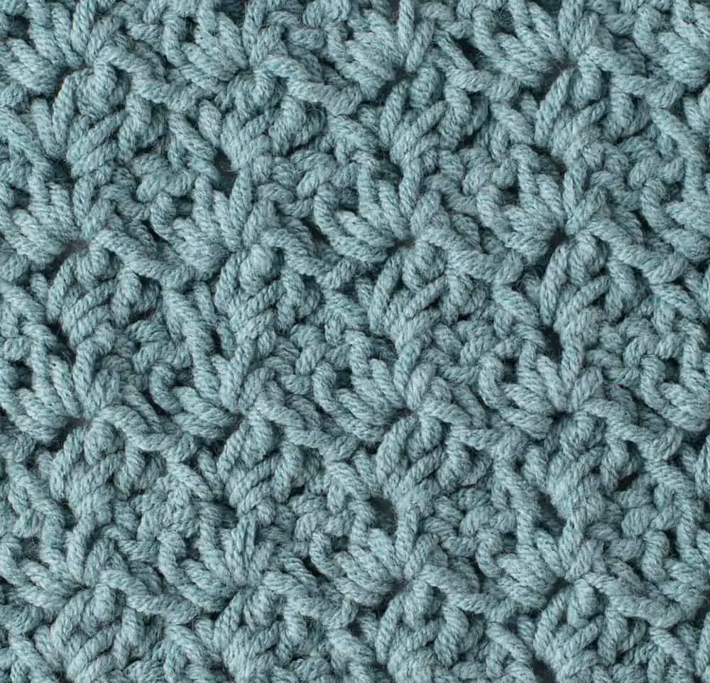 crochet tulip stitch in blue yarn