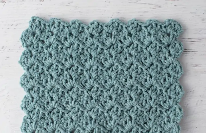 crochet tulip stitch in blue yarn