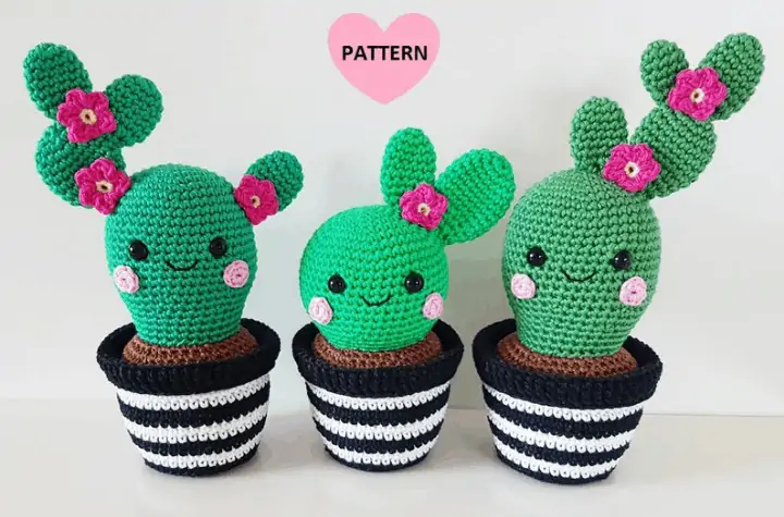 three crochet cactuses