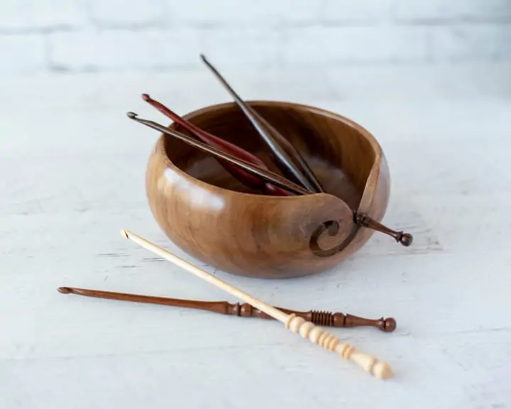 wood crochet hooks in wood bowl