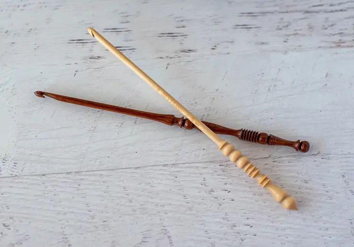 Two wood crochet hooks