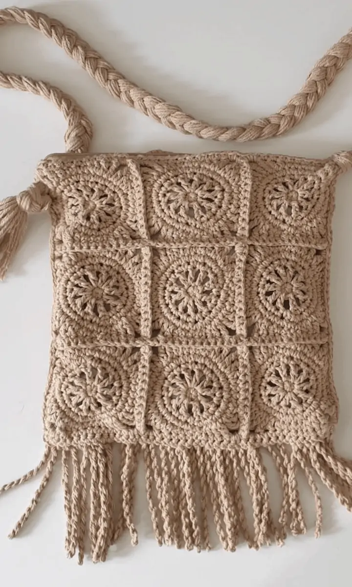 brown crochet bag with tassles