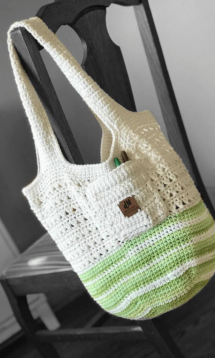 crochet bag with pocket hanging on a chair