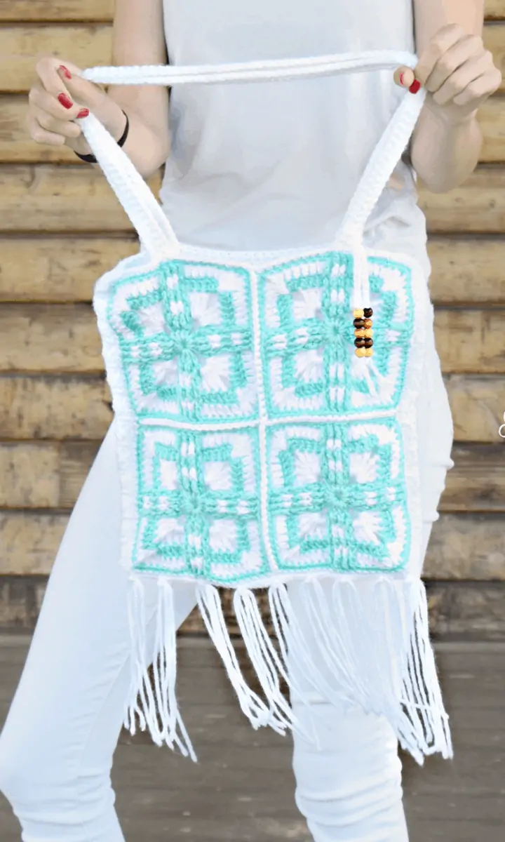 crochet blue and white bag with tassles