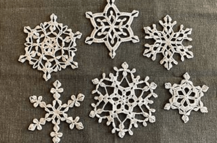six various crochet snowflakes