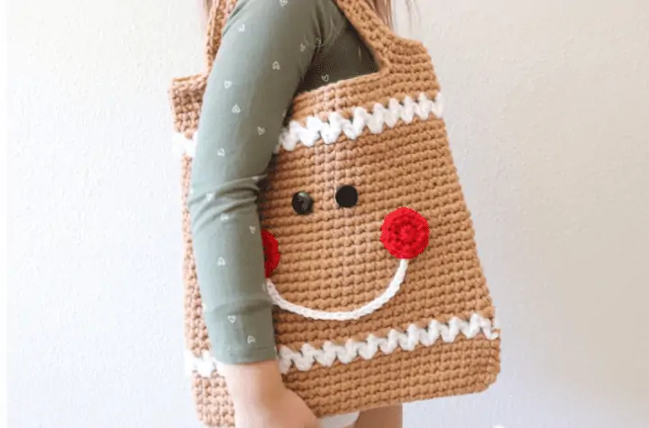 girl carrying crochet gingerbread tote bag
