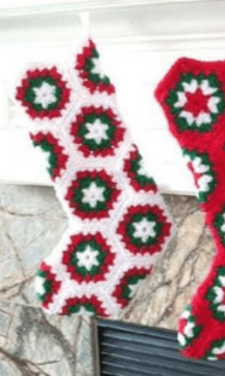 two crochet red, white, and green granny stockings