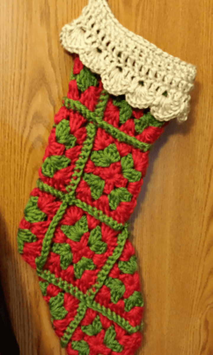 crochet red and green granny stocking with white trim