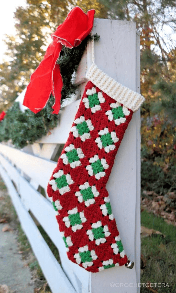 crochet red, green and white granny square stocking with white trim