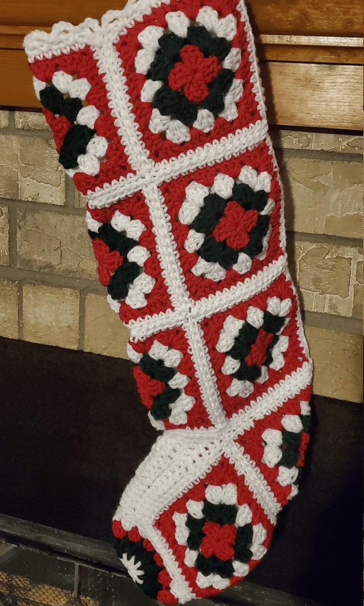 crochet black, red, and white granny square stocking