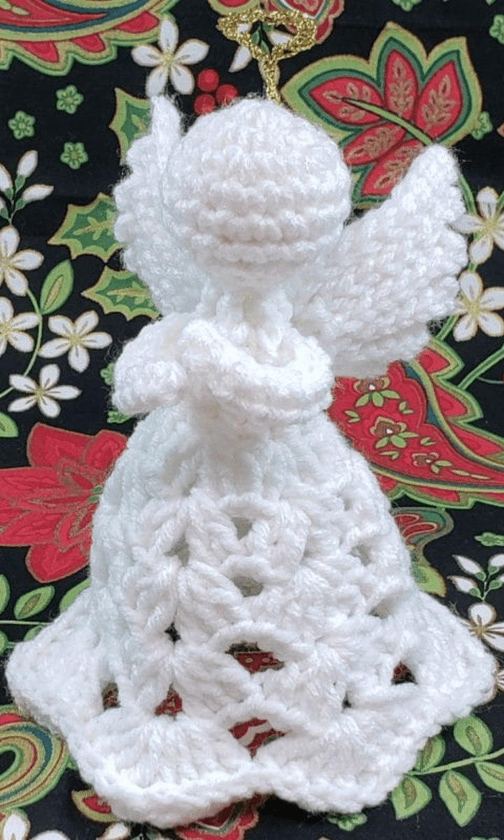 white crochet angel with gold halo