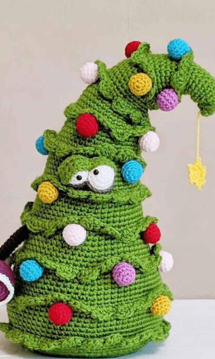 Christmas tree toy Crocheted green tree with white eyes and big red lips Christmas tree