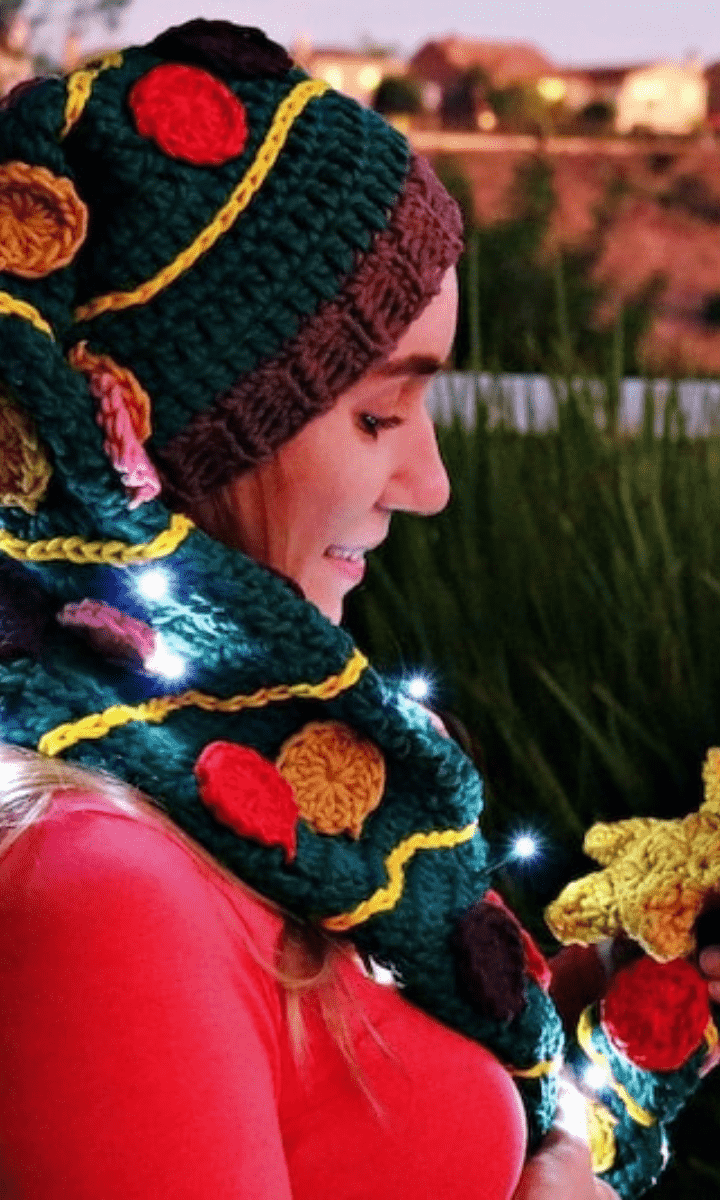 woman wearing crochet christmas tree slouch hat