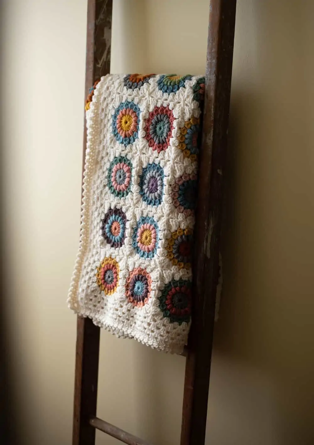 Crochet afghan on a ladder