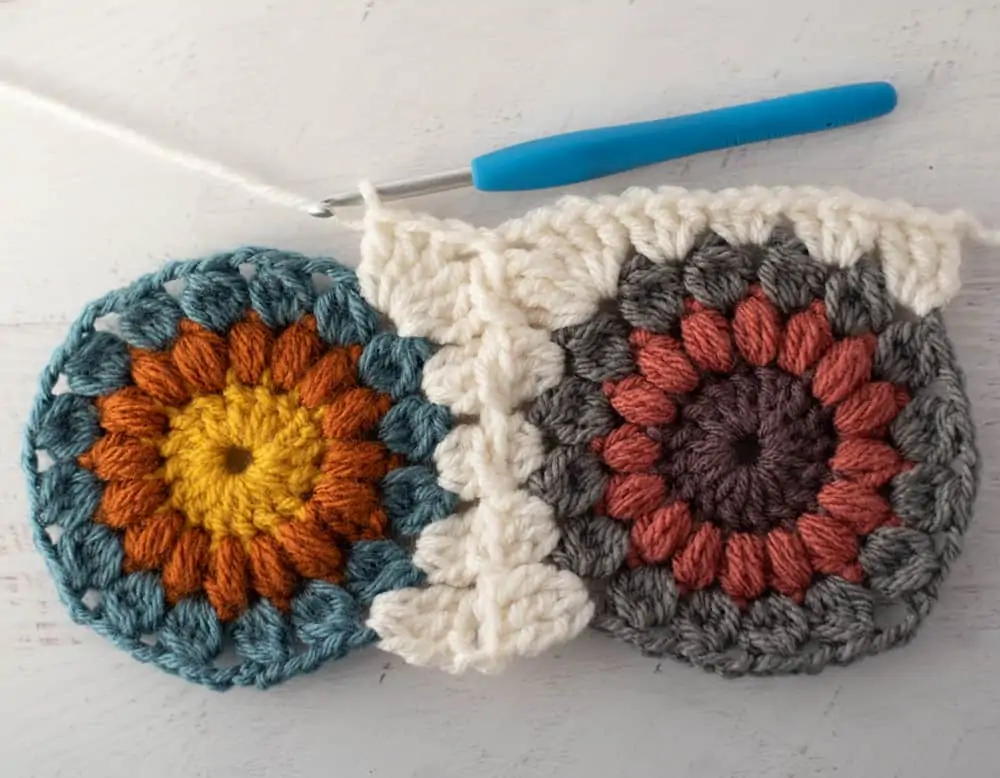 Joining crochet afghan squares with blue crochet hook