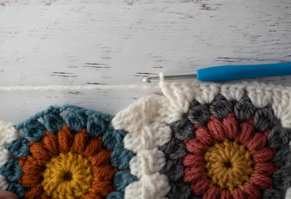 Joining crochet afghan squares with blue crochet hook